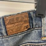 American Eagle 2000s  Ripped Distressed Medium Wash Boy Jean SZ 4 Photo 4
