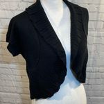 Fashion Bug  Shrug Sweater Short Sleeves Ruffled Hem & Neck Black-Small Photo 0