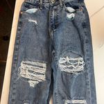 Pretty Little Thing Mid Blue Ripped Mom Jeans Photo 5