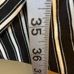 Madison Asymmetrical Black and White Striped Dress Photo 3