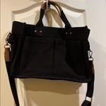 Black Canvas Tote Bag Brown Accents Detachable Strap 6 Pockets Outside on Bag Photo 2