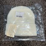cream beanie Photo 0