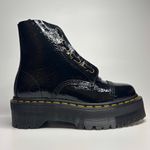 Dr. Martens Sinclair Distressed Patent Leather Platform Boots in Black Photo 1