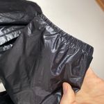 Mountain Hardwear Mountain Hardware black shiny hooded lightweight windbreaker size XS Photo 5