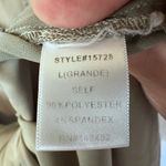 Staccato green blouse with tie back closure. Size large Photo 3