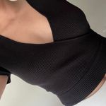 Francesca's Cropped Black Wrap Top Photo 1