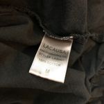 Lacausa  Reina Mini Dress Babydoll Oversized Shirred Neckline Ruffle Hem Black M Photo 7