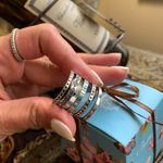 Beautiful silver plated 5 connected rings with blue stones Photo 9