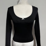 Women's Black Long Sleeve Scoop Neck Top with White Trim and Bow size Medium Photo 0