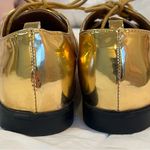 Rue 21 junior gold metallic lace up shoes size 7/8 Photo 4