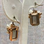 Iridescent Faceted Gem White Flower Accent Whimsical Fairycore Dangle Earrings Purple Photo 3