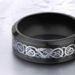 Zales Unisex Stainless Steel
8MM Carbon Fiber Celtic Dragon Wedding Ring Band Size 6 Photo 2