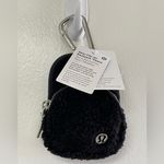 Lululemon Nano Clip-On Backpack Fleece in colors Light Ivory/Burnt Caramel. Photo 4