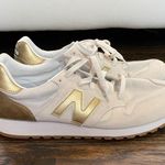 New Balance Gold Balance 520 Sneakers Photo 0