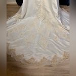 Alfred Angelo Ivory Off-Shoulder Wedding Dress with Gold Embroidery + Veil & Bouquet Photo 9