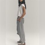 Free People NWT  FP Movement Inspire Logo Tank - white buti logo combo - Small Photo 2