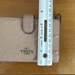 Coach  Medium Corner Zip Wallet Signature Debossed Patent Leather Pink Hue Photo 9