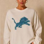 NFL Detroit Lions White Sweater with Blue sequins glitter lions logo size XL Photo 0