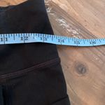 Athleta  Relay Capri 2.0 Workout Athlete Training Zip Back Side Pockets Womens S Photo 3