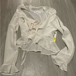 No Boundaries  Cream Sheer Ruffle Blouse Photo 0