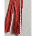 Lululemon  leggings Salmon orange with floral detailing Sz 4 Photo 3