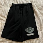 Small Black Green School Basketball Shorts Photo 0