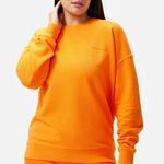 Outdoor Voices  Pickup Sweatshirt in Clementine Photo 0