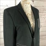 Handmade Ladies blazer
Charcoal in color with gray pocket. Photo 9