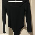 A New Day Bodysuit Photo 0