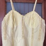 Urban Outfitters Yellow Spaghetti Strap Corset Style Romper NWT- M Photo 1