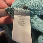 Maurice's  black & blue semi-sheer striped top with keyhole back. Photo 7