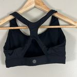 Athleta  Sports Bra Womens XS Black Cut Out Racerback Medium Support Athleisure Photo 1
