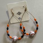 NWT Black and Orange Beaded Baseball Hoop Earrings. Photo 0