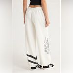 FP Movement by Free People All Star Oversize Graphic Joggers Ivory/Black Combo Black Size M Photo 7