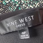 Nine West Snakeskin print fitted dress with a V-neckline and buckle details at the waist. Photo 5