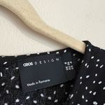 ASOS Design Tea Jumpsuit with Button Back Cutout Polka Dot Black Size 4 Photo 6