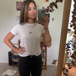 Brandy Melville  White Baby Tee Photo 1