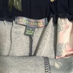 Good Luck Gem Flower pattern flowing shorts with pockets. Photo 3