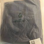 Halara NWT  Flex High-Waisted Crossover Pocket Washed Stretchy Flare Jeans Photo 8