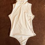 Tcec  white boutique bodysuit  size large  Photo 0
