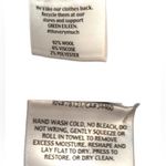 Eileen Fisher  black, elastic waist, short “sweater” skirt in size XS. EUC Photo 6