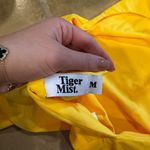 Tiger Mist Yellow body suit.  Photo 2
