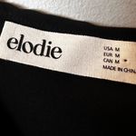 Elodie Ruffle Crop Camisole Elegant Black Top Photo 4
