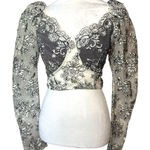 Elegant Floral Lace Blouse in Black and white Photo 0