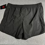 New Balance  Women’s Core Woven Shorts Photo 2