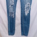 American Eagle  Medium Wash Next Level Stretch Mid Rise Distressed Jegging Jean Photo 3