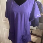 Skechers  purple scrub top  Size large Photo 0