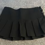 Chic Black Pleated Mini Skirt with Belt Detail Size XS Photo 1