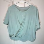 Nike Womens Dri-FIT One Luxe Twist Front Short Sleeve Top Athletic Mint Green 1X Photo 1