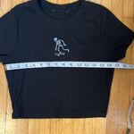 PacSun Black Crop Top—Skeleton riding Skateboard, tag cut out but probably from Photo 2